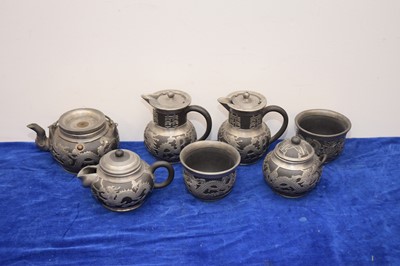 Lot 483 - A mid 20th century Chinese black basalt and pewter mounted tea set