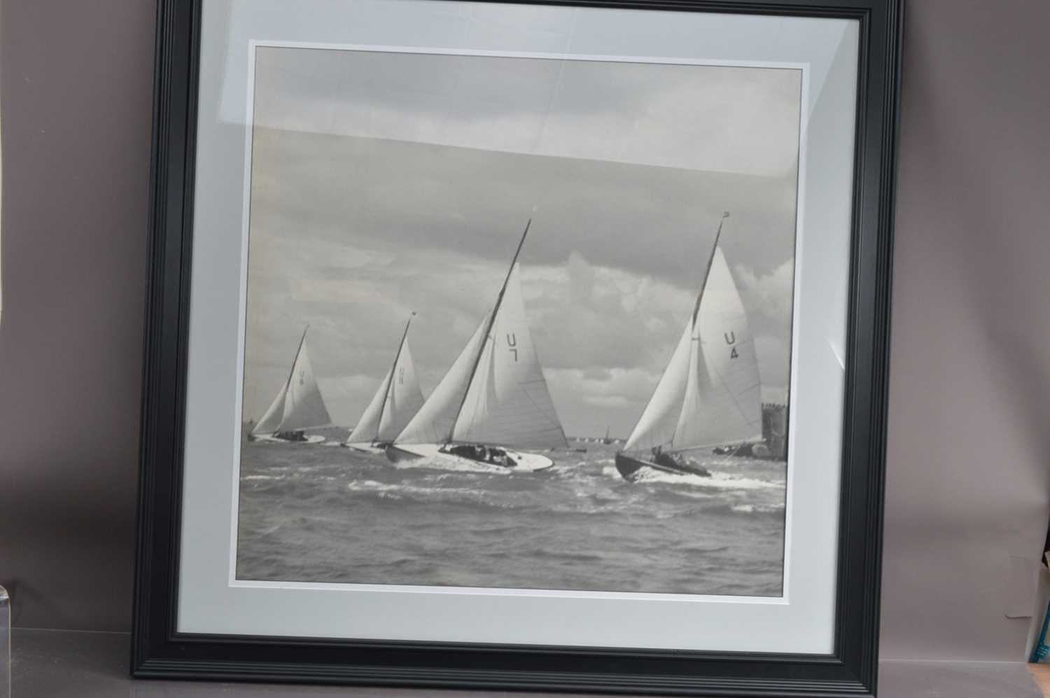 Lot 557 - Beken of Cowes Archive "A Yacht Race", a large format photographic reproduction of an image from the Beken of Cowes Archive. Very well framed and presented. Image 67 cm by 67 cm. Frame 90 cm by 90 cm