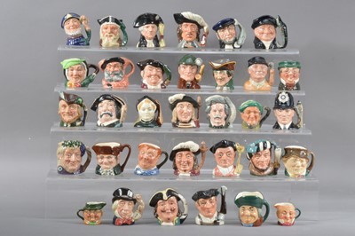 Lot 1 - A large collection of miniature Royal Doulton character jugs