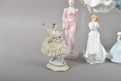 Lot 29 - A large collection of ceramic lady figurines