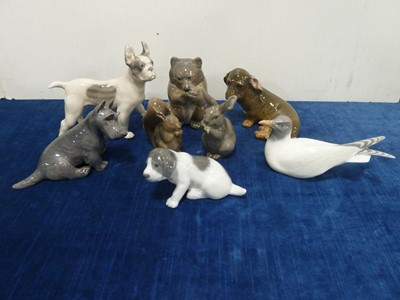 Lot 35 - A group of Royal Copenhagen porcelain small dogs and animals