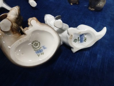 Lot 35 - A group of Royal Copenhagen porcelain small dogs and animals