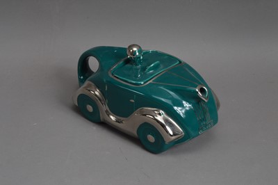 Lot 51 - A Sadler OKT42 Racing Car teapot and cover