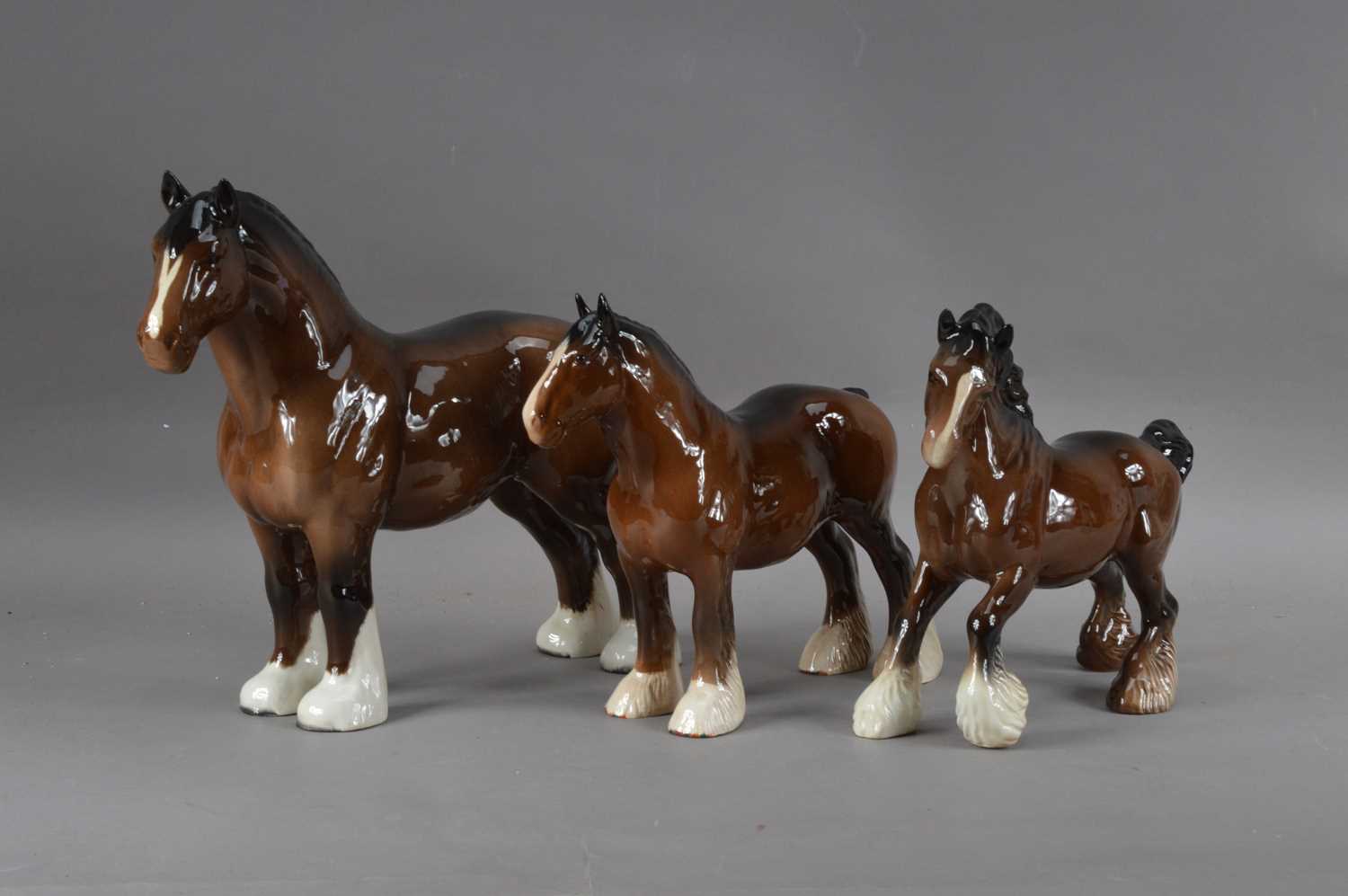 Lot 66 - Three Beswick ceramic shire horses