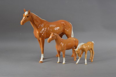Lot 67 - Three Beswick ceramic palomino horses