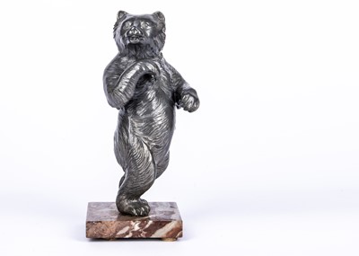 Lot 72 - A silvered metal sculpture of a walking upright bear, from the collection of Colonel Bob Henderson