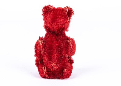 Lot 134 - A rare Schuco bright red mohair Teddy Bear, 1920s