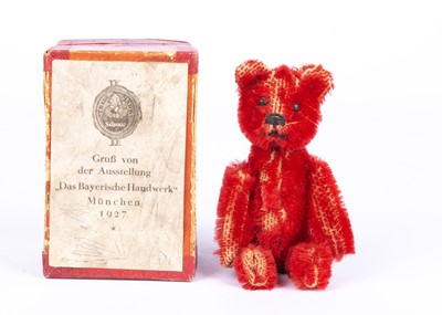 Lot 136 - A rare Schuco bright red mohair Teddy Bear perfume bottle, in original box, 1927