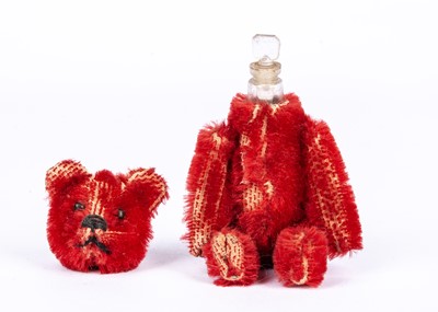 Lot 136 - A rare Schuco bright red mohair Teddy Bear perfume bottle, in original box, 1927