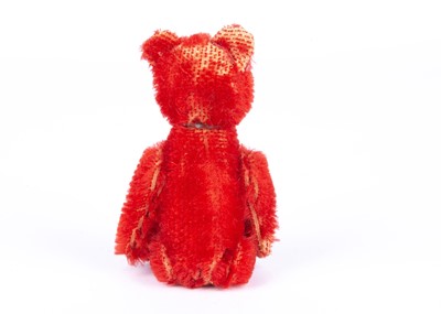 Lot 136 - A rare Schuco bright red mohair Teddy Bear perfume bottle, in original box, 1927