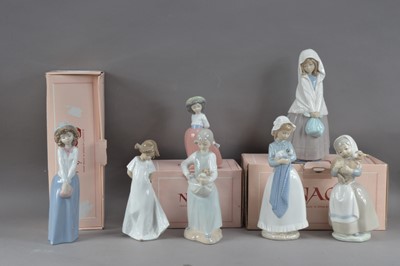Lot 92 - A collection of Nao porcelain figurines of girls