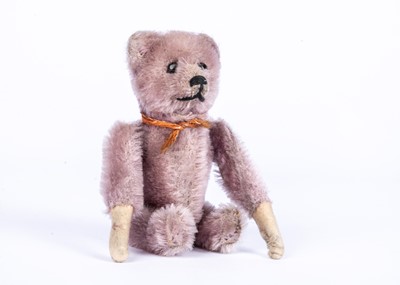 Lot 149 - A rare Schuco lilac mohair clockwork somersaulting Teddy Bear, 1930s