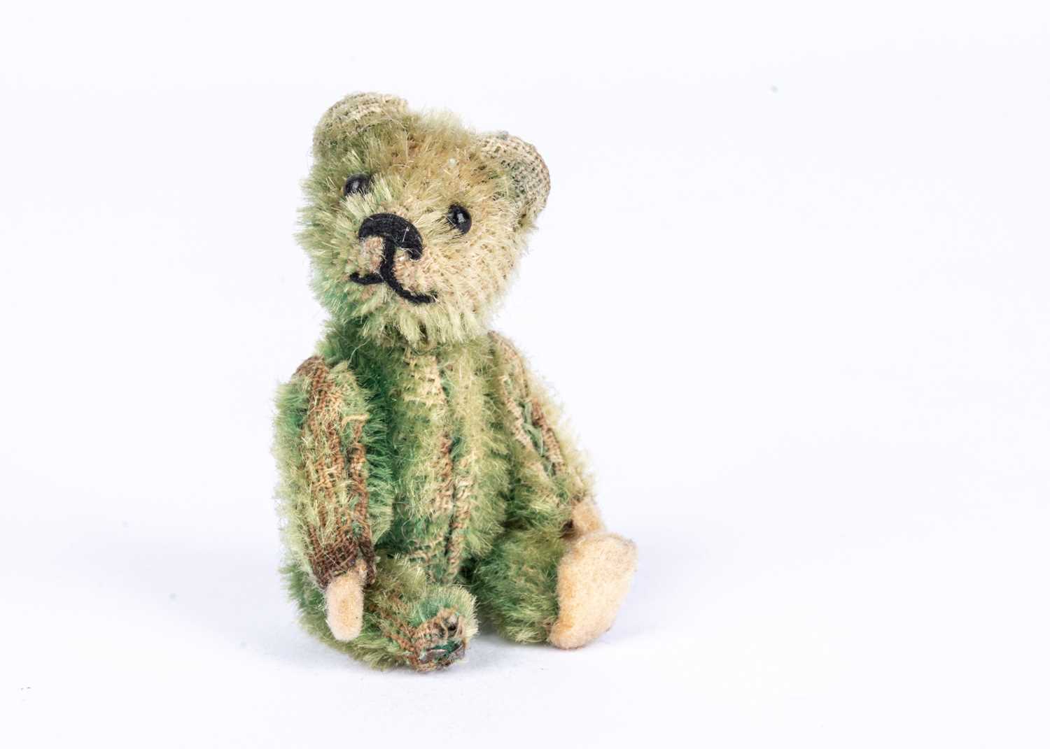 Lot 150 - A Schuco green mohair miniature Teddy Bear, 1930s