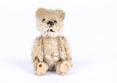 Lot 152 - A Schuco white mohair miniature Teddy Bear, 1930s