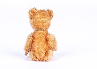 Lot 153 - A Schuco apricot mohair miniature Teddy Bear, 1930s