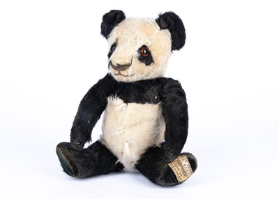 Lot 163 - A Merrythought panda Teddy Bear, 1939