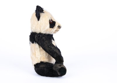 Lot 163 - A Merrythought panda Teddy Bear, 1939