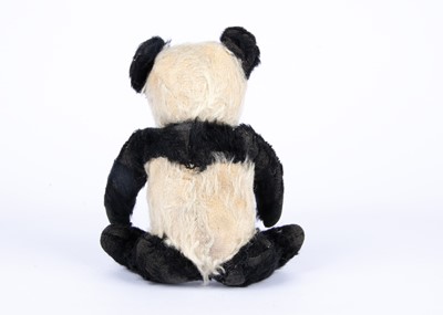 Lot 163 - A Merrythought panda Teddy Bear, 1939