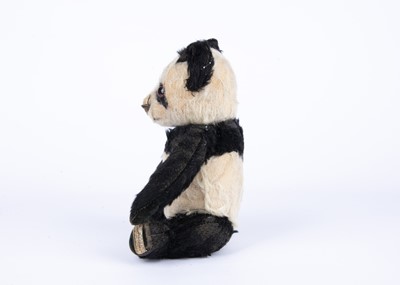 Lot 163 - A Merrythought panda Teddy Bear, 1939