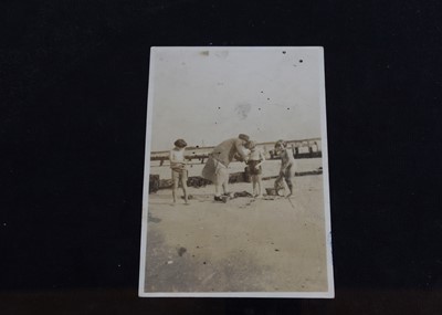 Lot 233 - Four original photographs of Christopher Robin and Anne Darlington at the beach