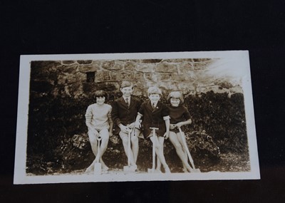 Lot 233 - Four original photographs of Christopher Robin and Anne Darlington at the beach