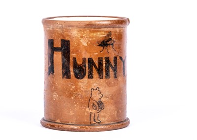 Lot 239 - A unique Winnie the Pooh ‘Hunny’ pot decorated by Christopher Robin Milne for his nanny Olive Brockwell