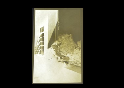 Lot 254 - An original photograph and negative of A.A. Milne, circa 1925