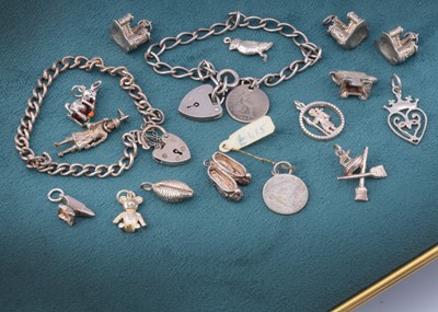 Lot 6 - A silver charm bracelet