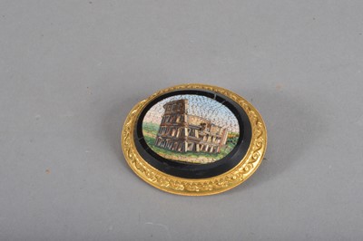 Lot 121 - A 19th Century micro mosaic oval yellow metal brooch