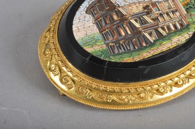 Lot 121 - A 19th Century micro mosaic oval yellow metal brooch