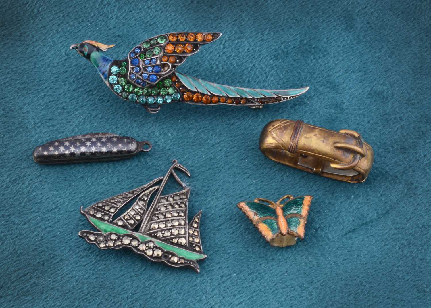 Lot 32 - A silver paste and enamel game bird