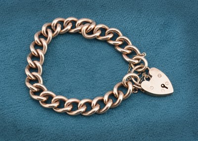 Lot 47 - A 9ct gold curb link and padlock clasp bracelet