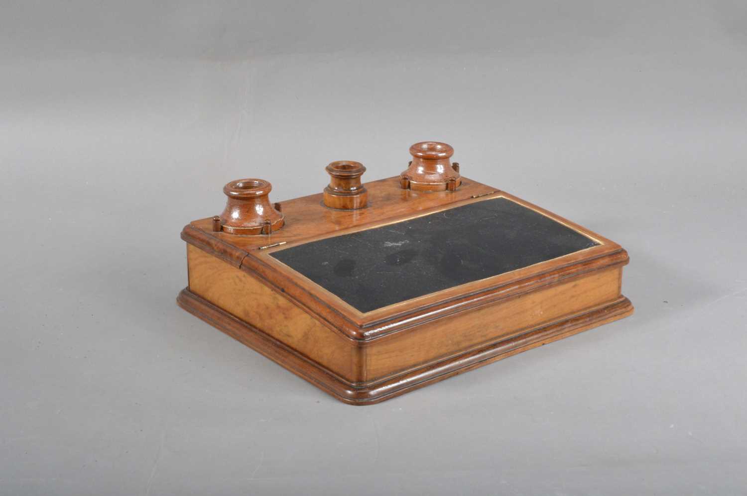 Lot 126 - A 19th century olivewood and stoneware inkwell