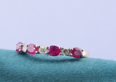 Lot 80 - A ruby and diamond 18ct gold