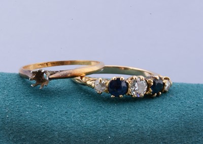 Lot 110 - A yellow metal sapphire and diamond five stone dress ring