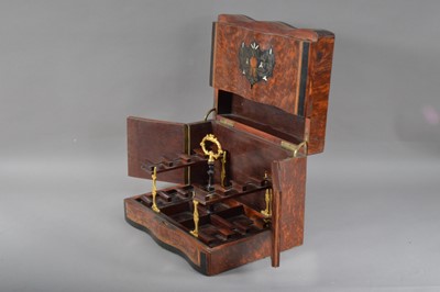 Lot 131 - A regency burr walnut veneered ebonised and boxwood inlaid decanter box