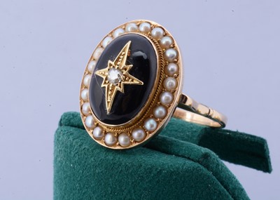 Lot 116 - A Victorian onyx and diamond mourning ring