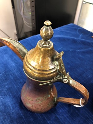 Lot 133 - Two vintage Middle Eastern copper coffee pots and a water pot