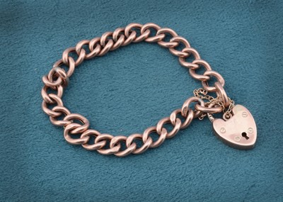 Lot 181 - A 9ct gold curb link and padlock clasp bracelet