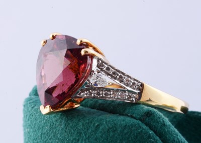 Lot 184 - An 18ct gold Lorique rubellite and diamond set dress ring