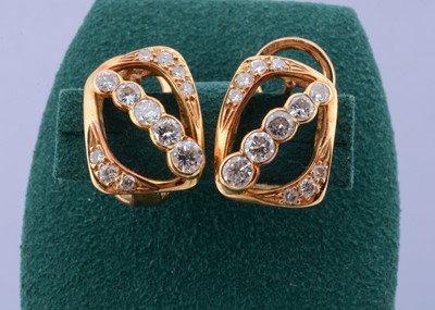 Lot 192 - A pair of 18ct gold diamond set clip stud earrings