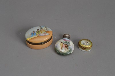 Lot 140 - A miniature oval Limoges box and cover