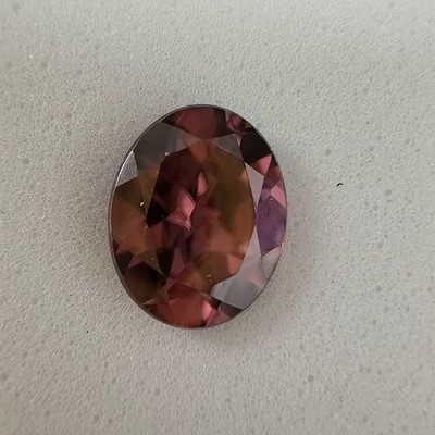 Lot 210 - A certificated Zanzibar Red Zircon