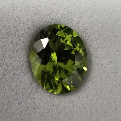 Lot 213 - A certificated Changbai Peridot