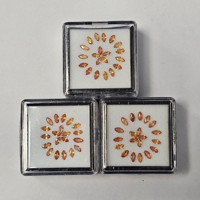 Lot 244 - Three certificated Orange Sapphire gem boxes