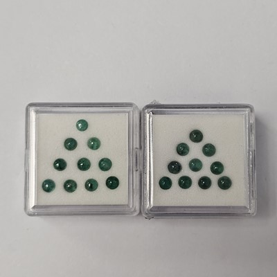 Lot 255 - Two certificated Itabira Emerald gem boxes