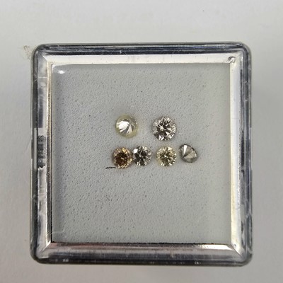 Lot 258 - Four certificated Fancy Diamonds