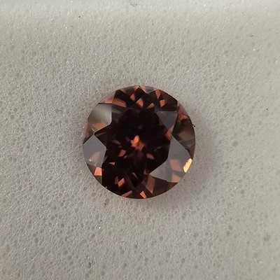 Lot 262 - A certificated Zanzibar Sunburst Zircon