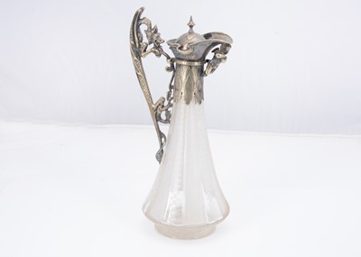 Lot 342 - A Victorian cut glass and silver plated claret jug