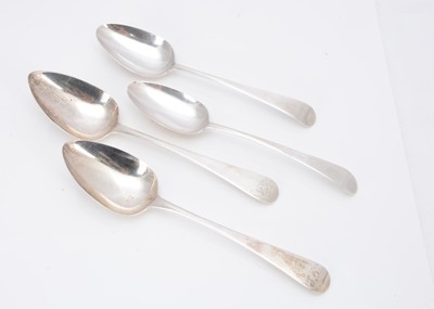 Lot 370 - Two pairs of George III silver old English pattern table spoons